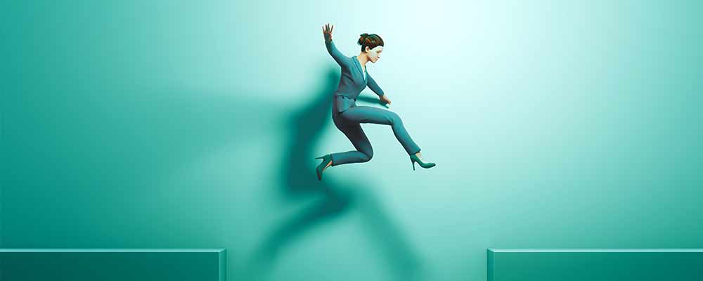 Graphic of woman wearing a business pant suit jumping across a gap 