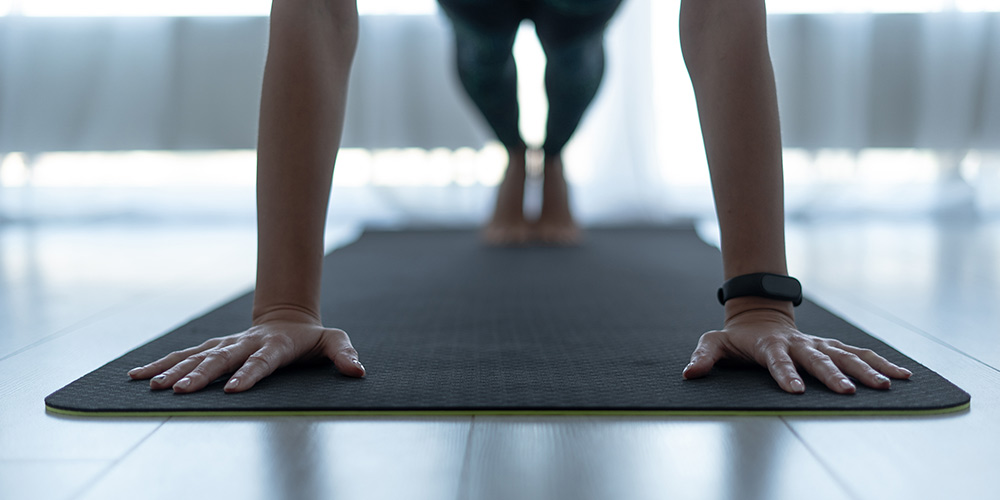 Person practicing yoga to help with Anxiety