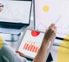 Woman looking at data on computer