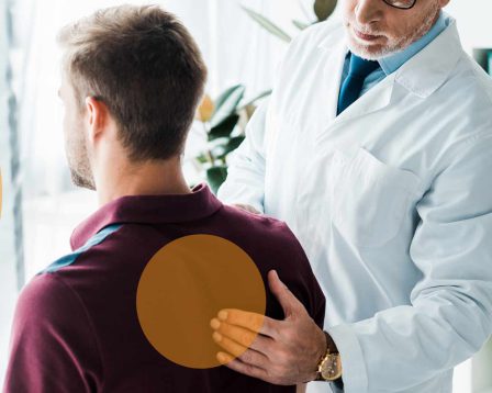 Doctor checking patient in pain